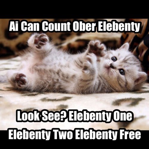 A kitten holding up its paws like it's counting.  "Ai can count ober elebenty.  Look see?  Elebenty one elebenty two elebenty free..."